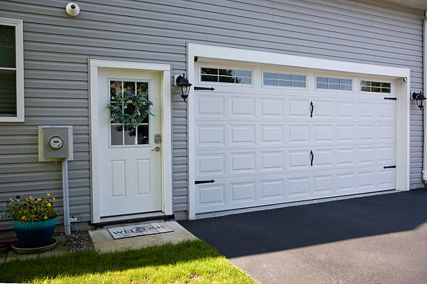 24/7 Emergency Garage Door Panel Replacement experts in Three Lakes, WA